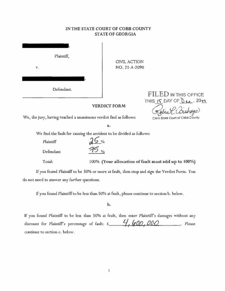 A redacted legal document, specifically of a verdict form from a personal injury case in Cobb County Georgia where the plaintiff was found 25 percent at fault and the defendant was 75 percent at fault.