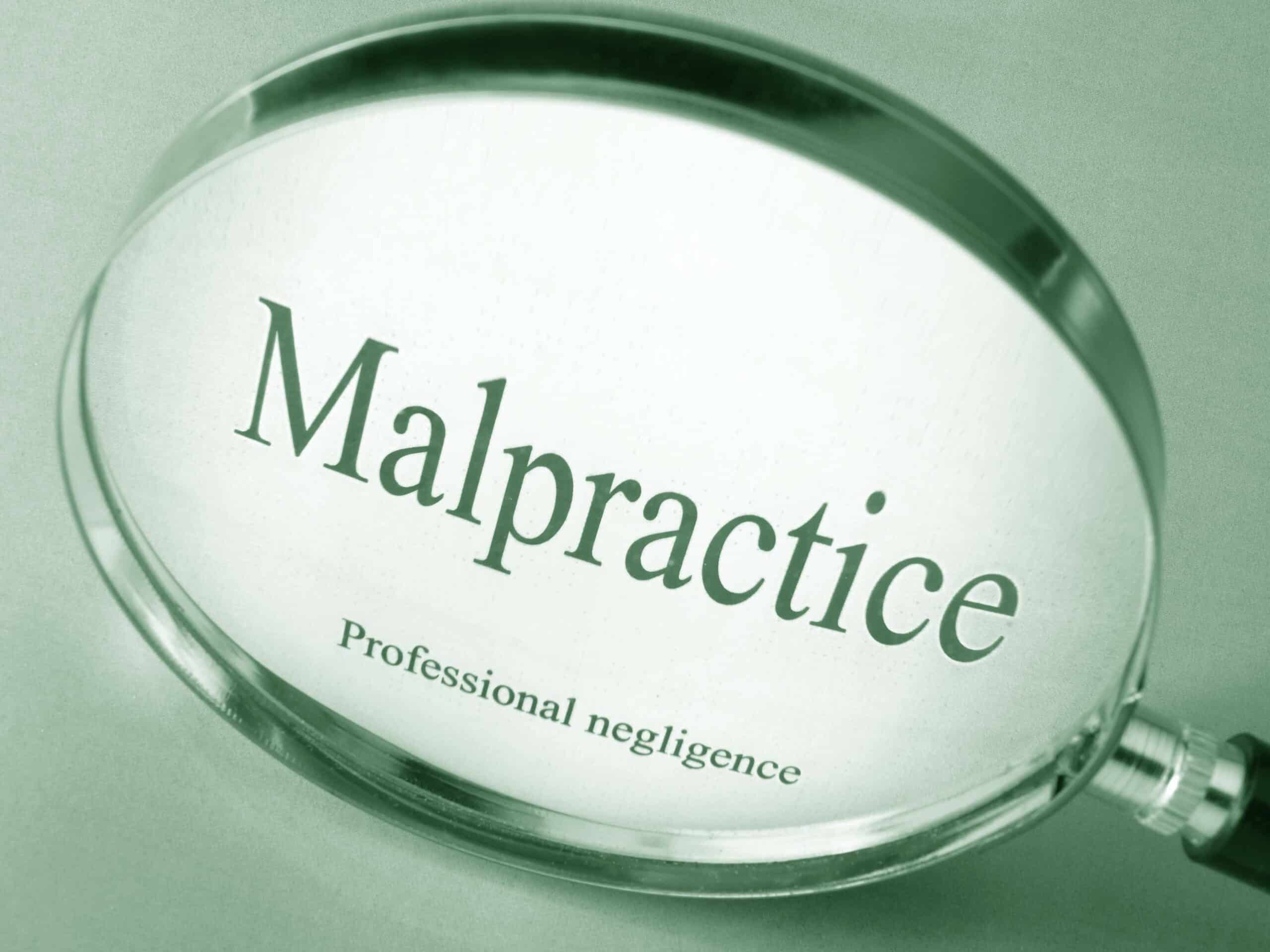 Words in magnifying glass -Malpractice Professional negligence
